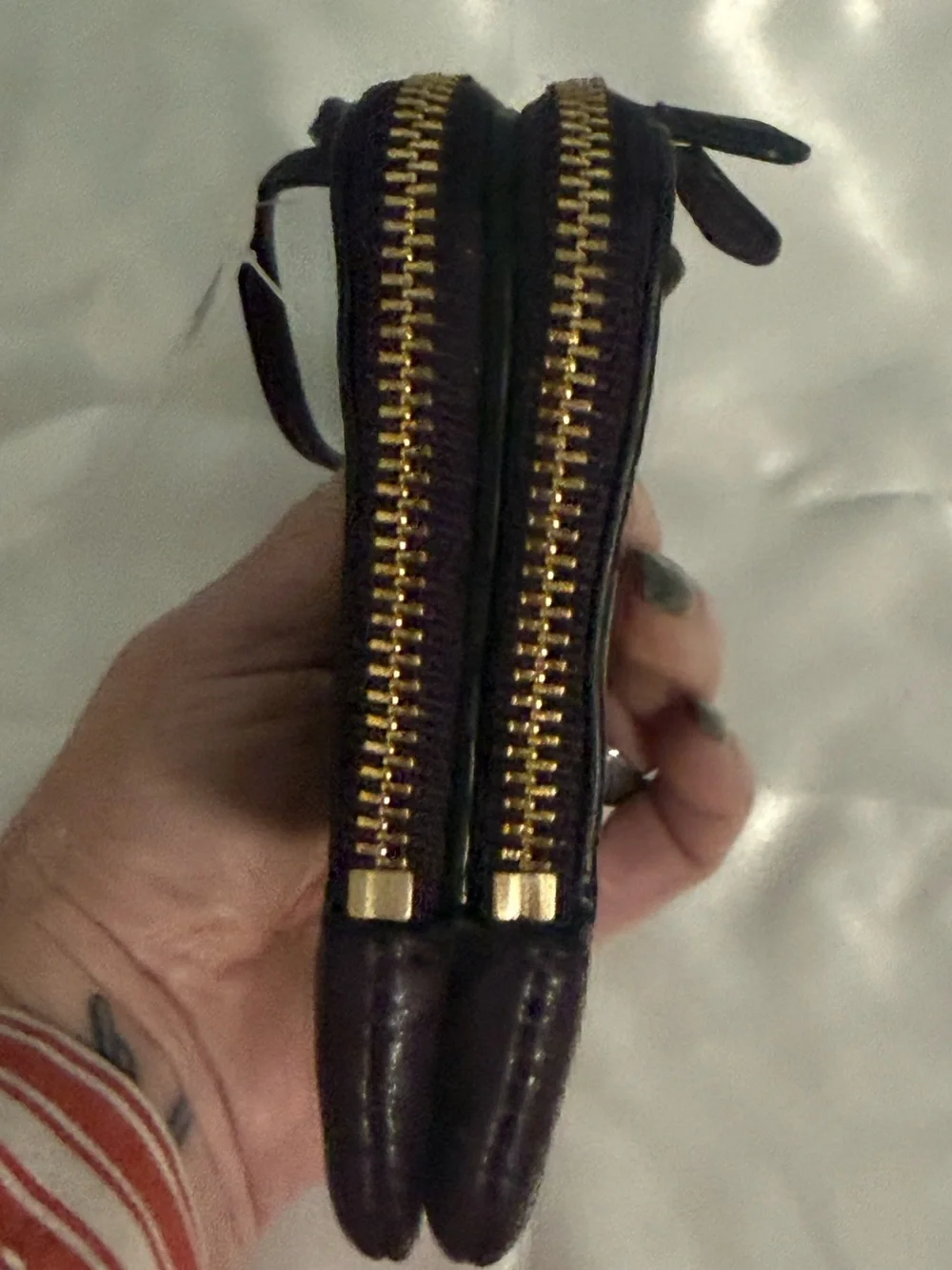Coach NWT Pebbled Leather Wristlet in Plum w/handtag and two zip compartments.